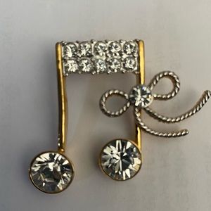 Butler 80’s musical note with Swarovski crystals. Christmas note